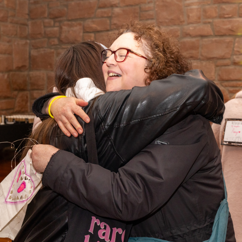 Participants hugging